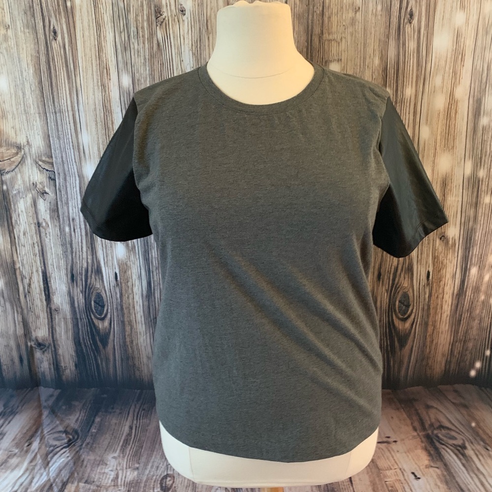 J Crew grey shirt with leather sleeves.